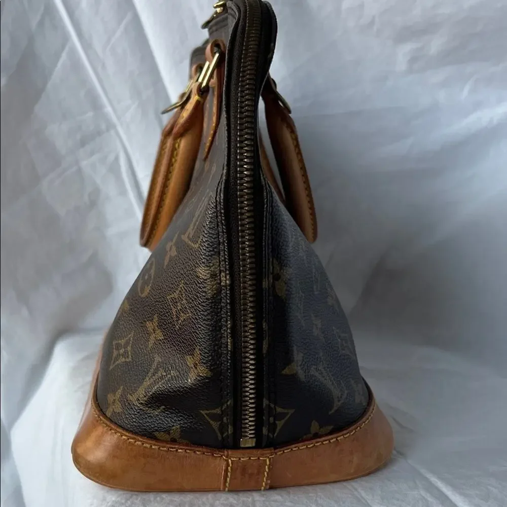 Louis Vuitton Alma PM Monogram Handbag